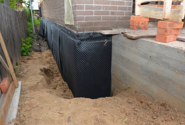 SJ Waterproofing Pros technician performing targeted Waterproofing assessment in Atwood, IL